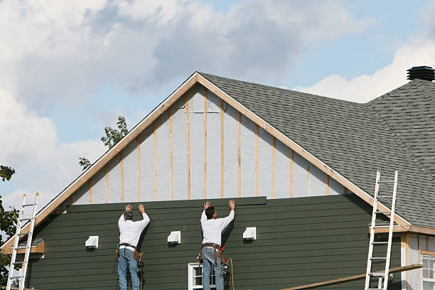 Professional Siding technician working in Newburg, PA